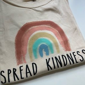 cream colored t-shirt; Dry Goods; size L